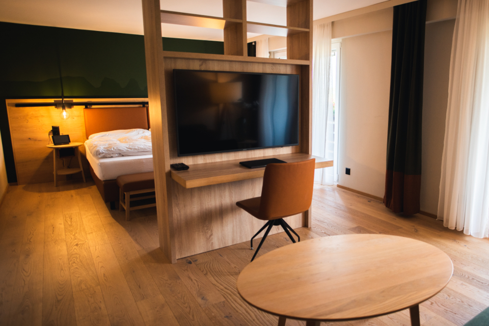A guest room being checked over before the next arrival