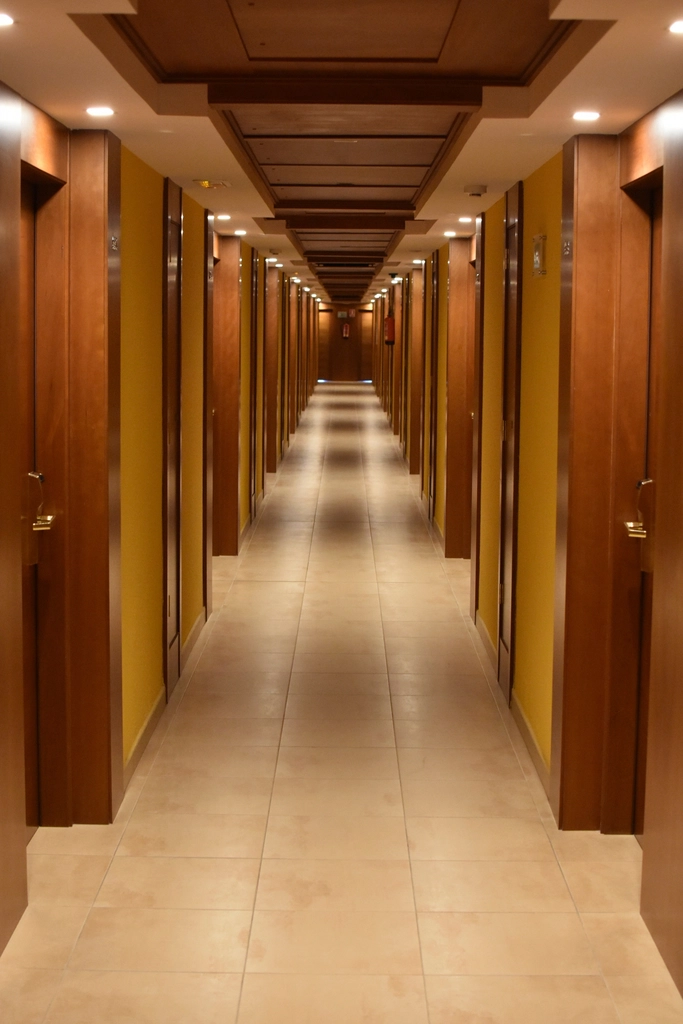A quiet hotel corridor during a morning shift
